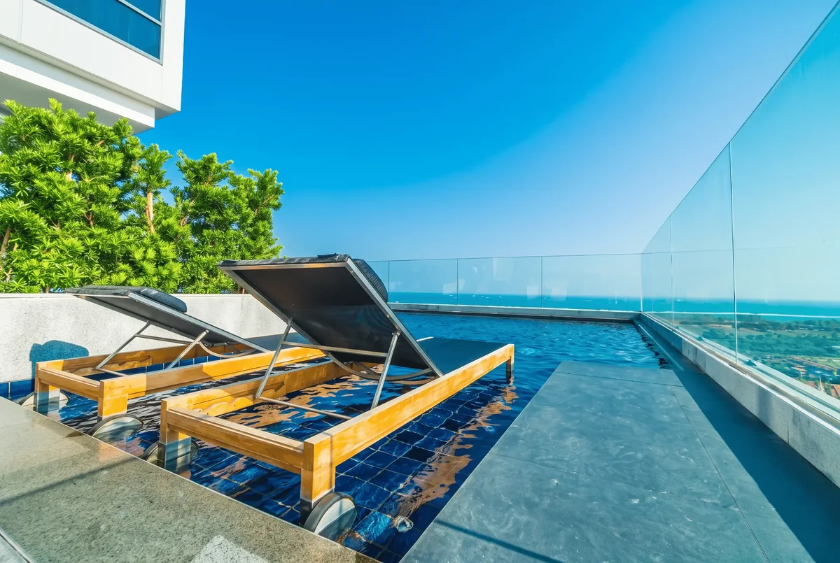 Poolside sun deck at 54 Flores Drive